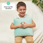 Child holding a textured pillow with a text overlay about vibrations