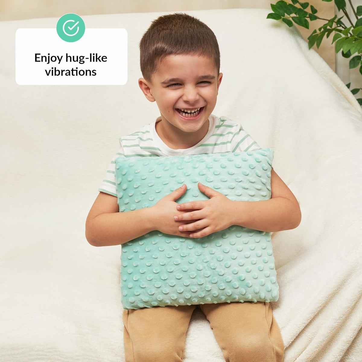 Child holding a textured pillow with a text overlay about vibrations