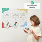 Child holding a card with emotional regulation cards on a white background