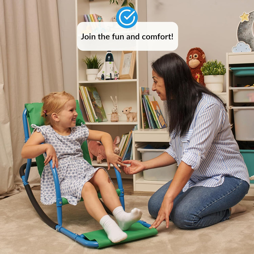 Mom assisting a child in a sensory chair in a home setting with books and toys in the background.