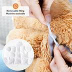 Person removing a plush toy's filling with text indicating removable filling and machine washability.