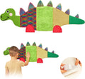 Colorful dinosaur-shaped wall decor with a child interacting with it.