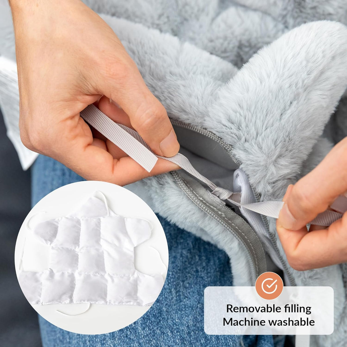 Person zipping a weighted plush cat, and a label indicating removable filling and machine washability.