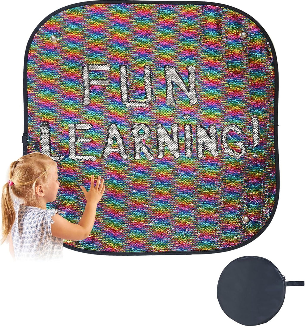 Child interacting with a colorful learning mat with 'FUN LEARNING!' text.