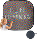 Child interacting with a colorful learning mat with 'FUN LEARNING!' text.