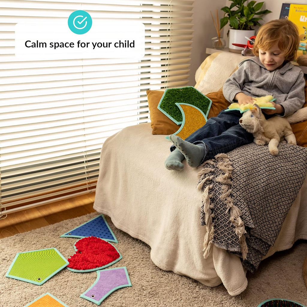 Child sitting on a bed with toys and a 'Calm space for your child' label.