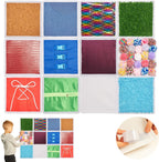 Collection of fabric tiles in various textures and colors with a child interacting with them.