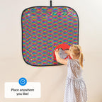 Child playing with a colorful patterned wall panel on a wall