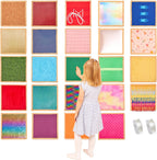 Child interacting with colorful textured panels on a wall
